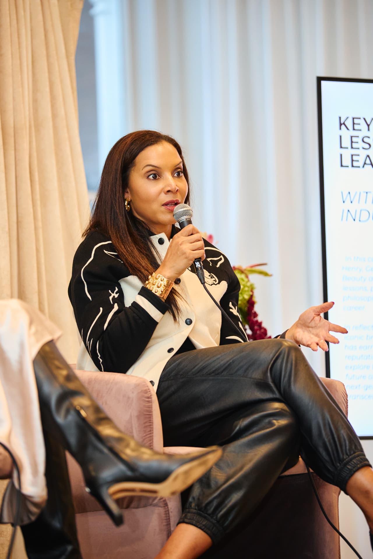 Speaker sharing insight at a Boardroom Beauty Leaders Summit